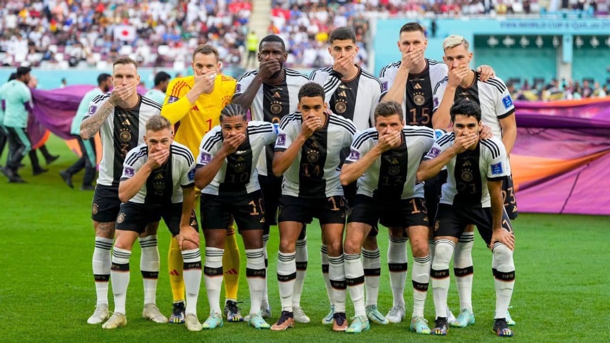 OneLove: German players cover mouths in photo