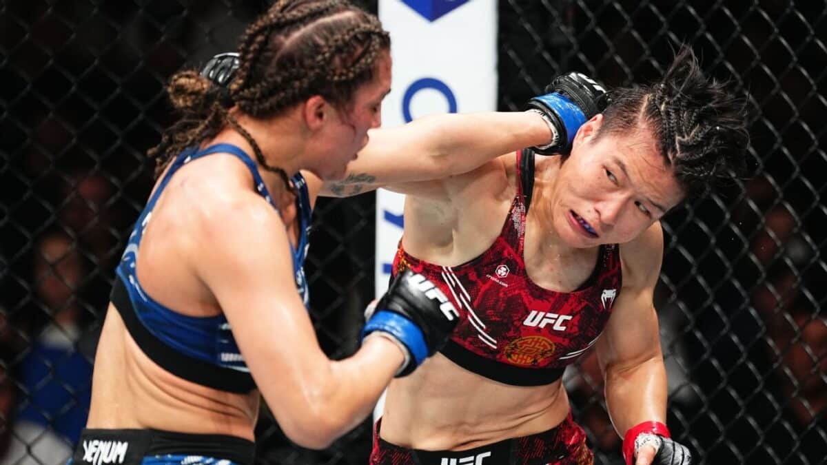 Zhang shuts down Suarez in 1-sided title defense